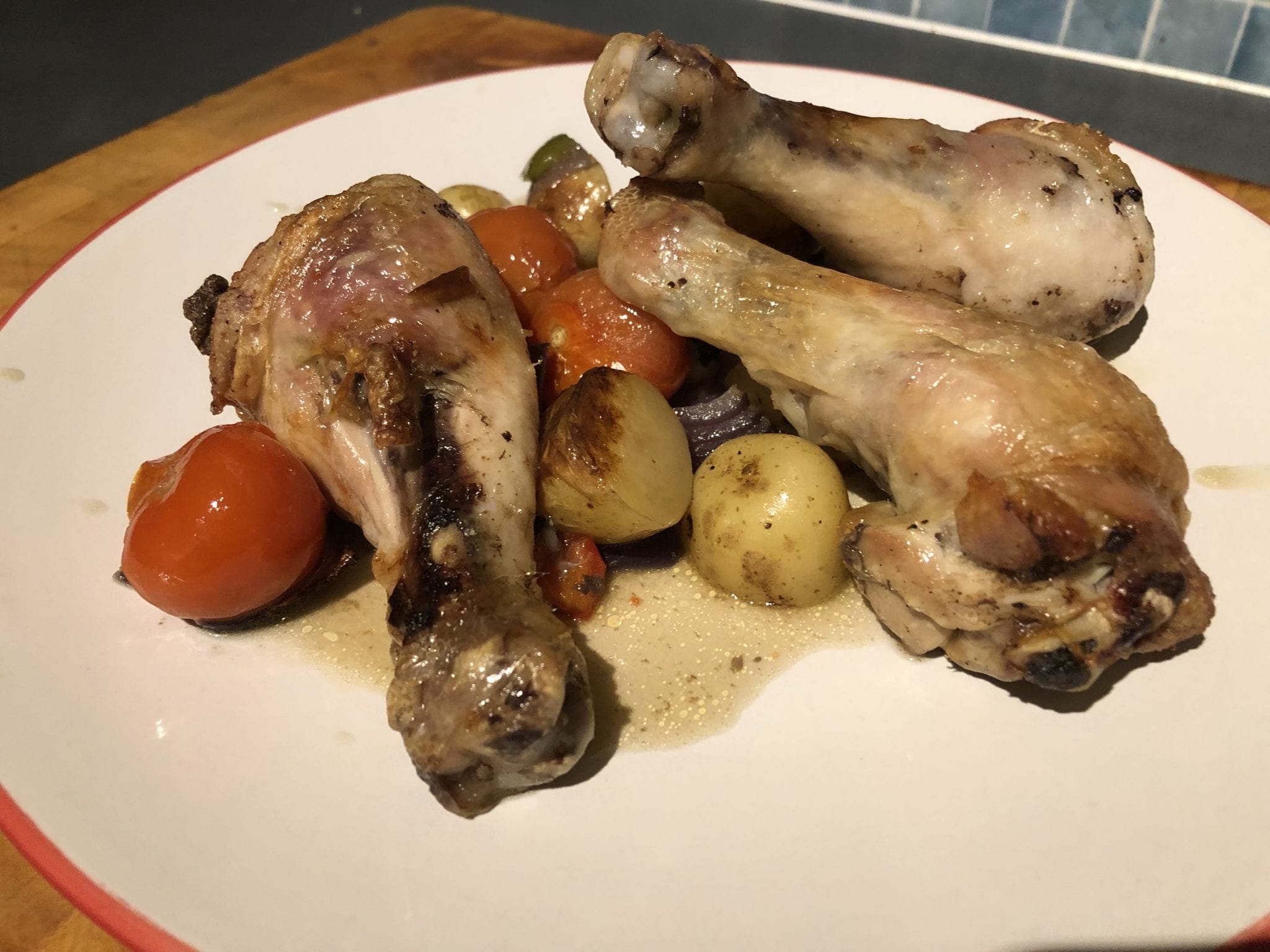 Chicken, potato, pepper and onion one pot bake served on a plate